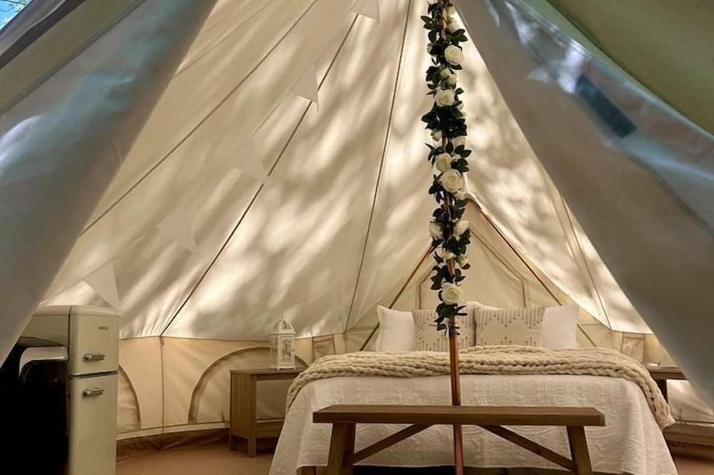 Gentry RV Rental | Peaceful Glamping Tents with Elevated Decks, Cozy Fire Pit, and Secluded Forest Views Near Gentry, AR