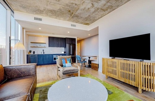 Rainey Street Historic District Condo | 13th floor corner condo, lake-view balcony, rooftop pool & gym, dog-friendly
