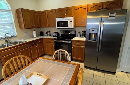 Windsor Palms House | Beautiful 4BR/3 ba House-3miles Disney large pool/spa/XLdeck-Wheelchair friendly