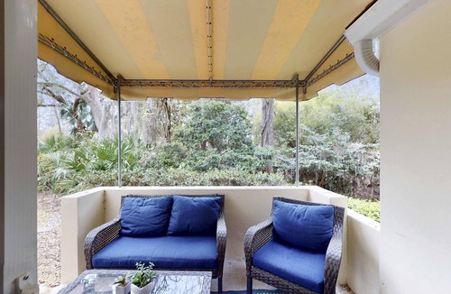 Shipyard Plantation Villa | Charming French Inspired Villa, Dog Friendly Retreat with Patio, Pool & Tennis