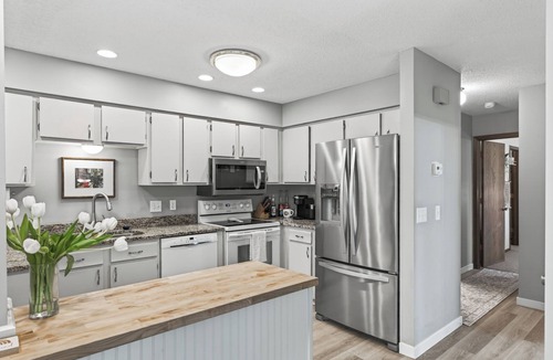 Maple Grove House | Close to businesses, hospitals, freeways in a wooded neighborhood next to trails