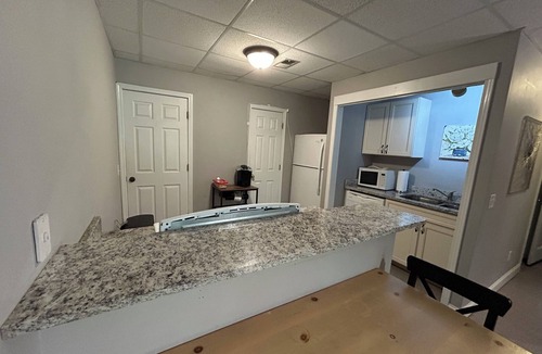 Johns Creek Apartment | Cozy Johns Creek lower level apartment with private entrance & parking by door