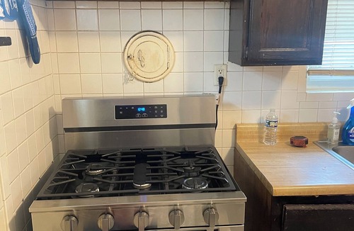 Airport Township House | Delightful 2-bedroom house with AC in Berkeley Iconixx Getaway STL