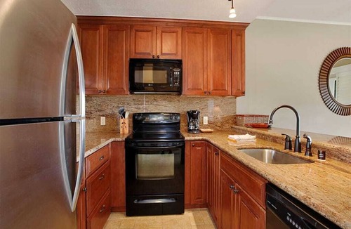 Lihue Condo | East Kauai w/ocean view lanai, open kitchen, WiFi, ceiling fans, TV, DVD–Kaha Lani 209