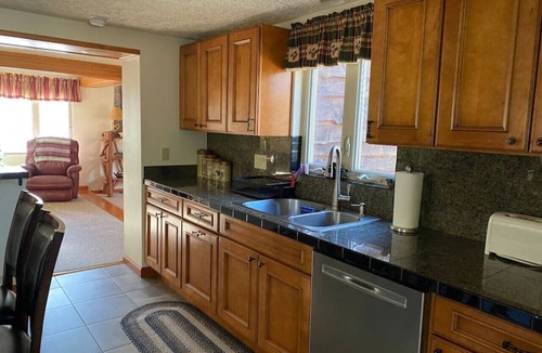 Confluence Cottage | Fall Getaway Creek Haven: Sleeps 6 · 3BR 1BA · Hot Tub Fire Pit Grill Fireplace