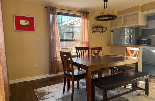 McKnight House | Historic Swan Acres Retreat: 4BR, Hot Tub, Gym & Walkable to Dining
