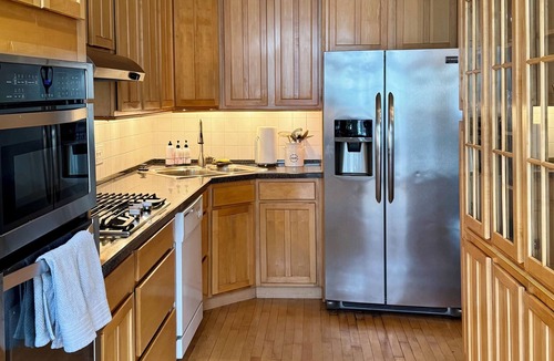 Old Town House | Ideal Group Getaway: Prime Location, Parking, Backyard, Sunroom & Pet-Friendly
