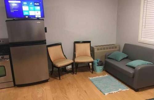 Lakewood Apartment | Lakefront Studio with hardwood floors, pebble beach, and fire pit for memories!
