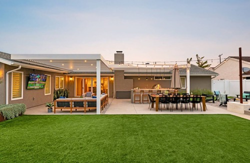 University City House | Luxury 5BR w/Resort Backyard, Huge Hot Tub, Fire Pit, Game Room, Putting Green