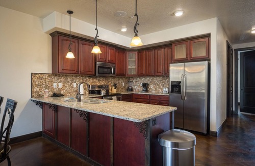 Moab Condo | Luxury Condo in Downtown Moab | Private Hot Tub | Pet Friendly | Easy Parking
