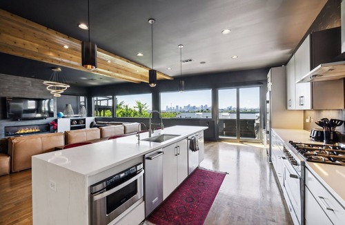 Katie Hill Neighborhood House | Luxury Skyline Mansion with Game Room