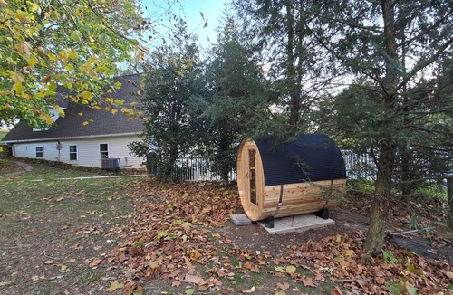 Witmer Cottage | Luxury Waterfront Cottage with Wood Burning Fireplace + Hot Tub + Backyard Sauna