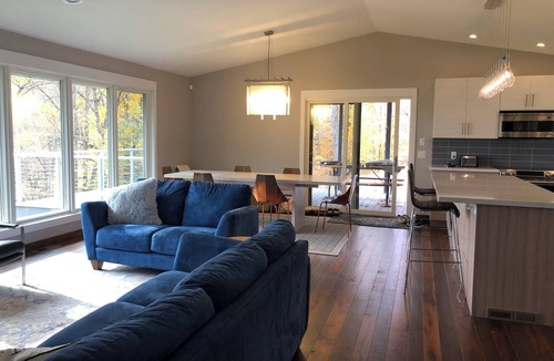 Aitkin House | Modern retreat on Cedar Lake- quiet wooded lot with beautiful lake view!