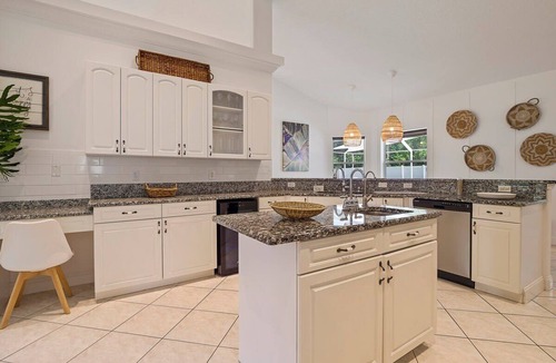 Palm Coast House | Oasis Heated Pool Spa Fenced Yard Bicycles