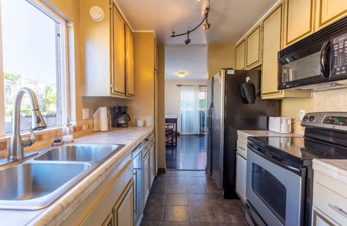 Crown Point Condo | PB Condo only Steps to the Bay with Private Patio!