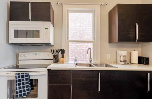 Pacific Terrace Hotel | Perfect for business trips, conventions & fun getaways — just a minute’s walk to the San Diego Convention Center, PETCO PARK, nightlife, and public transit. Includes secure, free parking for one vehicle plus a dedicated workspace and high-speed Wi-Fi