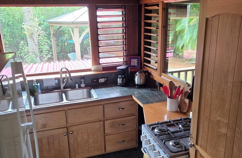 Kilauea Cottage | Private Handcrafted Cottage, Walk to Secluded Beach, Hot Tub, Tandem Kayak, WiFi
