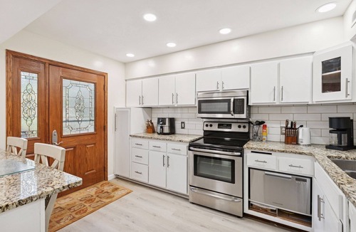 Plymouth House | Spacious, Modern 5-bedroom House with Hot Tub near Medicine Lake