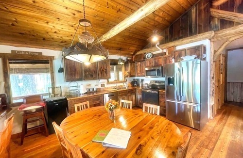 Bigfork Cabin | Swan River Retreat: 5 Cabins on River. Sleeps 30. Family Reunions!