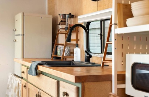 Sylva RV Rental | Tesla Camp, Riverside, Hot Tub & Mountain Views