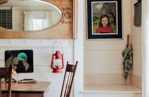 Almelund Cottage | Unity Farm: Three private cottages set across restored prairie and forest along the St. Croix River, with a barn and tennis courts.