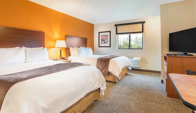 4 Modern Extended-Stay Rooms w/All Essentials for Business