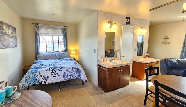 Cozy nautical-themed studio with private entrance