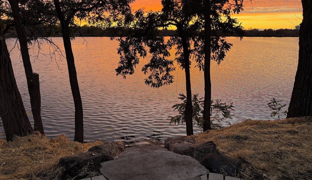 Enjoy beautiful sunsets year round from this spacious 3 BR home on Lake Orono.