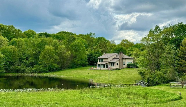 Gorgeous Rural Escape on 14 Acres with Pond