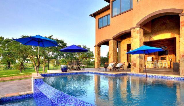 Lake Travis Waterfront Home w/ views, Pool, Dock, Outdoor Kitchen, Open-Air Bar