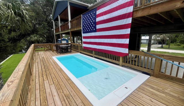 Luxury Canal-Front 4BR Home, Large Patio, Dock, Springs Access, Boater Friendly