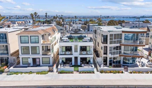 Luxury oceanfront fourplex with roof deck, sleeps 22