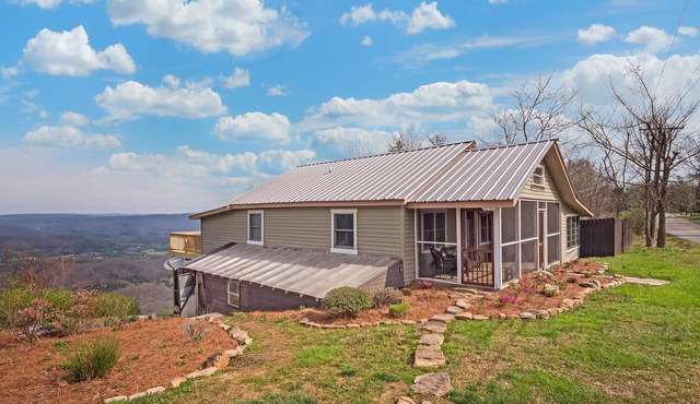 Mountain view home with a hot tub, washer/dryer, central AC, deck