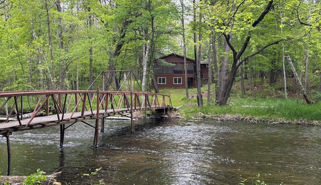 Private riverfront cabin with wooded hiking trails in Amery