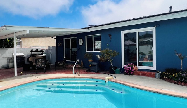 Relax at this Family Home w/Solar heated Pool & Game Room. Close to everything!