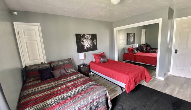 Rm #2. 1 double bed, 1 single bed smart TV, street/mountain view.