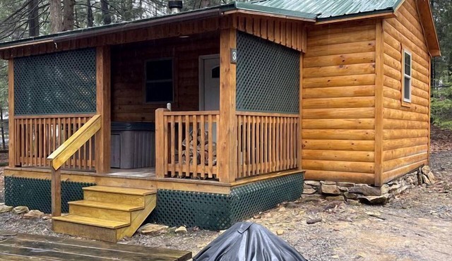 Romantic Cabin Escapes to this Charming Cook Forest Rental with Private Hot Tub