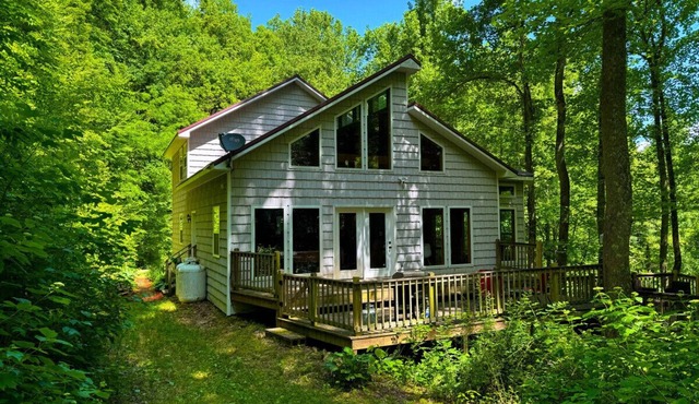 Secluded Luxury Cabin with Private Waterfall, Mountain Views, Game Room, and Scenic Hiking Trails