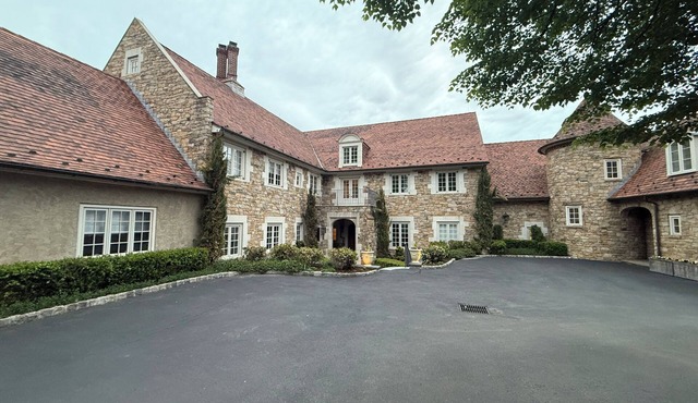 Spacious 7-bedroom estate on 10+ acres in lovely Villanova with pool and jacuzzi