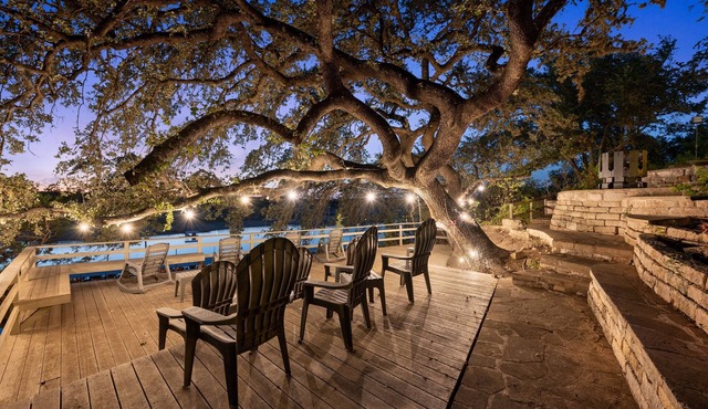 SPECTACULAR LAKEFRONT OASIS Over 400 feet frontage on 2 acres of century oaks