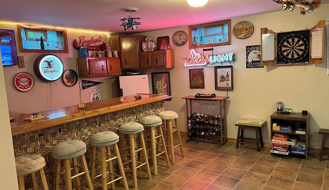 This spacious, pristine 3 bedroom retreat is ideal for families & larger groups in Akron