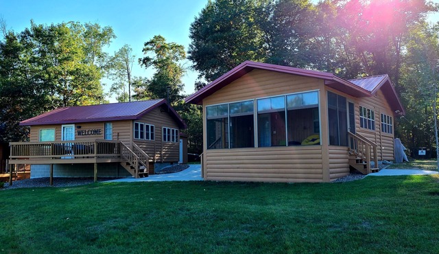 Two cabins right on the lake, including shared game room!