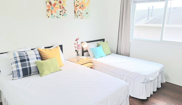 Updated 2 BR Condo - Walk to Train!