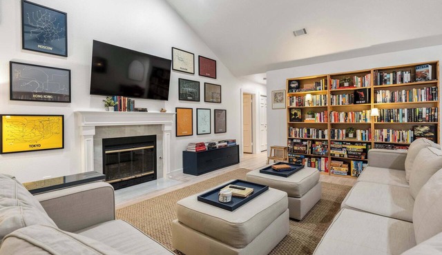 Vaulted Ceilings Home with 2,000-Book Library