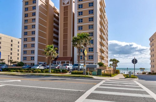 Daytona Beach Shores Apartment | Elegant Oceanfront Pool Hot Tub at Sanibel Condos