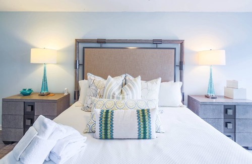 South Beach Condo | Updated & Gorgeous End Unit with Spectacular Views of Pool & Sound. South Beach Oasis Awaits you!