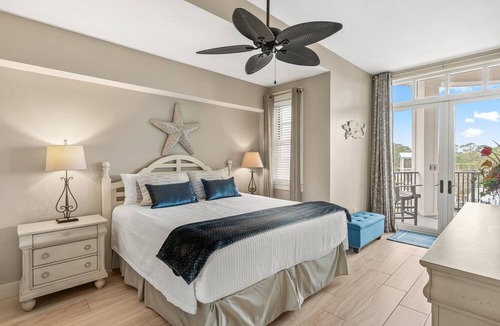 Baytowne Wharf Condo | RARE! HUGE Balcony Overlooking Baytowne Wharf! Trop Pool, Hot Tub, Beach Tram
