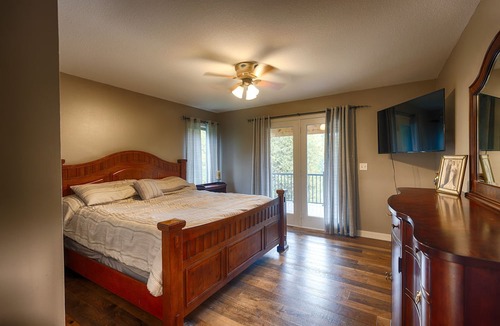 Tower House | Stunning Lakefront Retreat with Hot Tub & Fishing Paradise