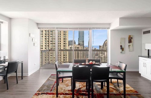 Downtown Chicago Apartment | Two-Story Penthouse, City Views, Pool, Gym