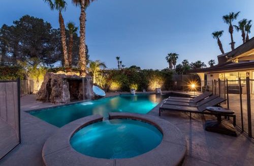 Canyon Gate Villa | Luxury Villa, with bonus pool house, Private Pool, Hot tub, rock water fall and slide, putting green, basketball, shuffle board, play gym, privately gated on circular driveway.